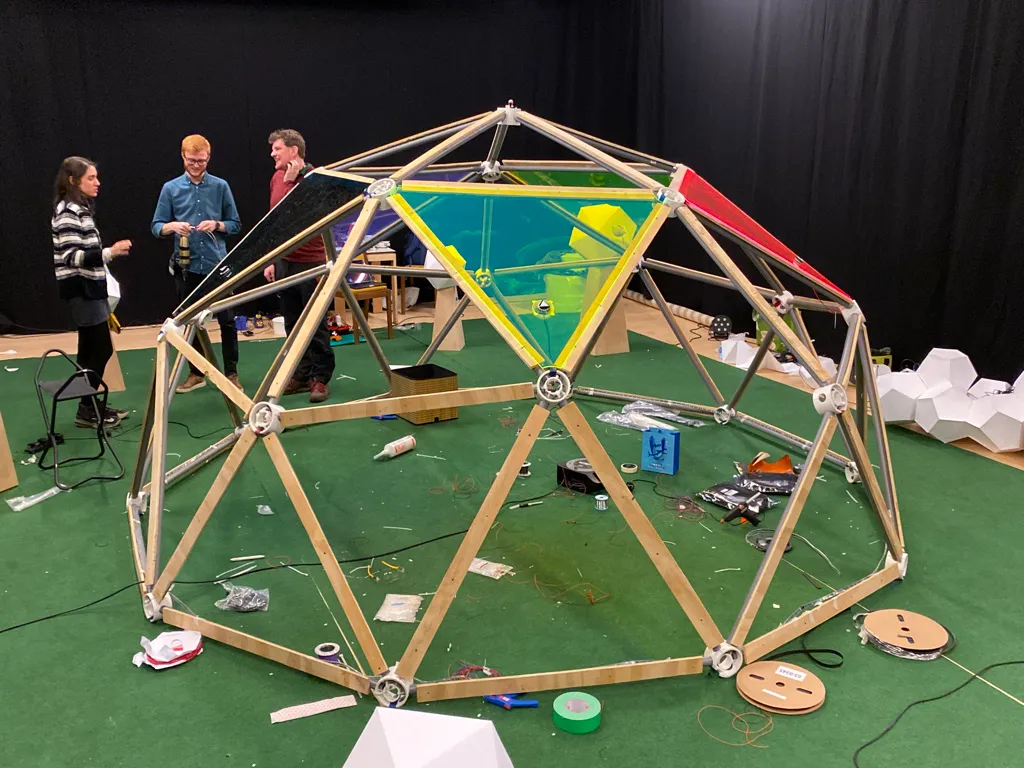 The dome’s timber frame under construction in the studio