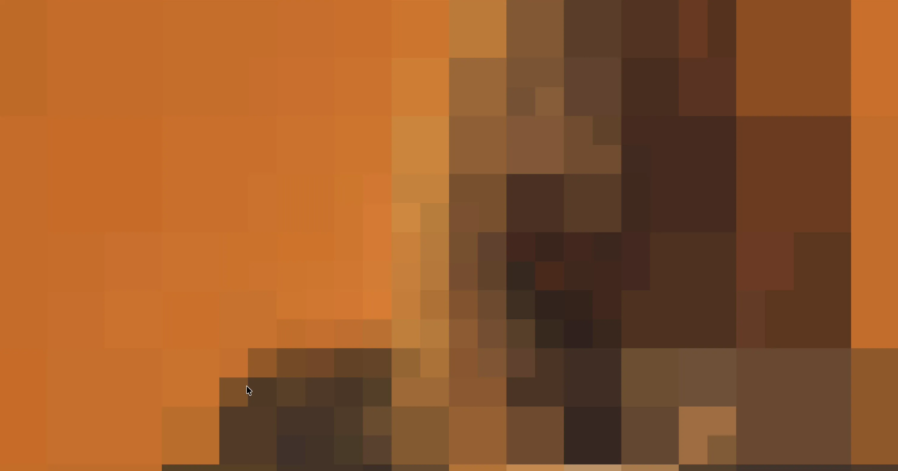 A product image mid-reveal: coarse mosaic blocks refining outward from the focal point